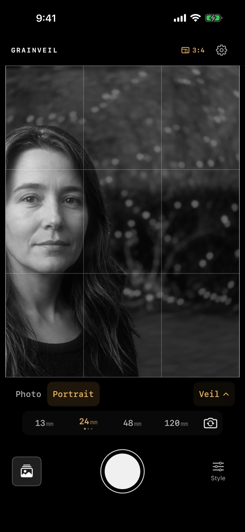 Grainveil 1.1 in Portrait mode with Veil selected, showing a monochrome portrait against soft foliage