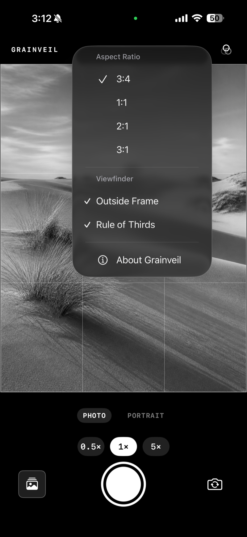 Grainveil framing controls over a sculptural monochrome dune landscape